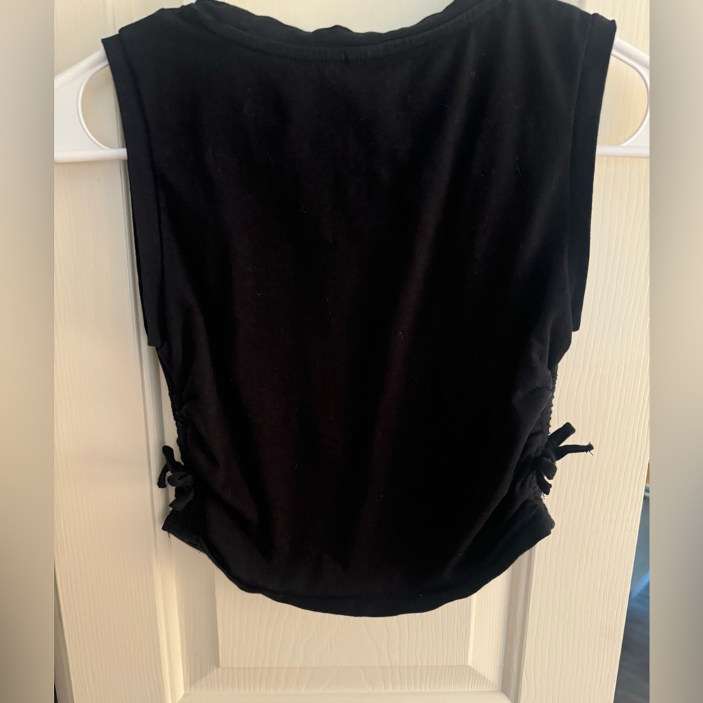 High neck black top with bows on side